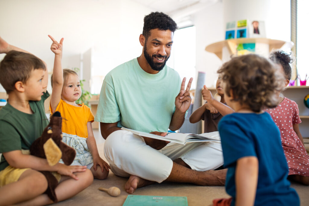 Teacher with several children.