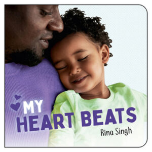 A preschool age daughter leans against her father's shoulder as he smiles down at her.